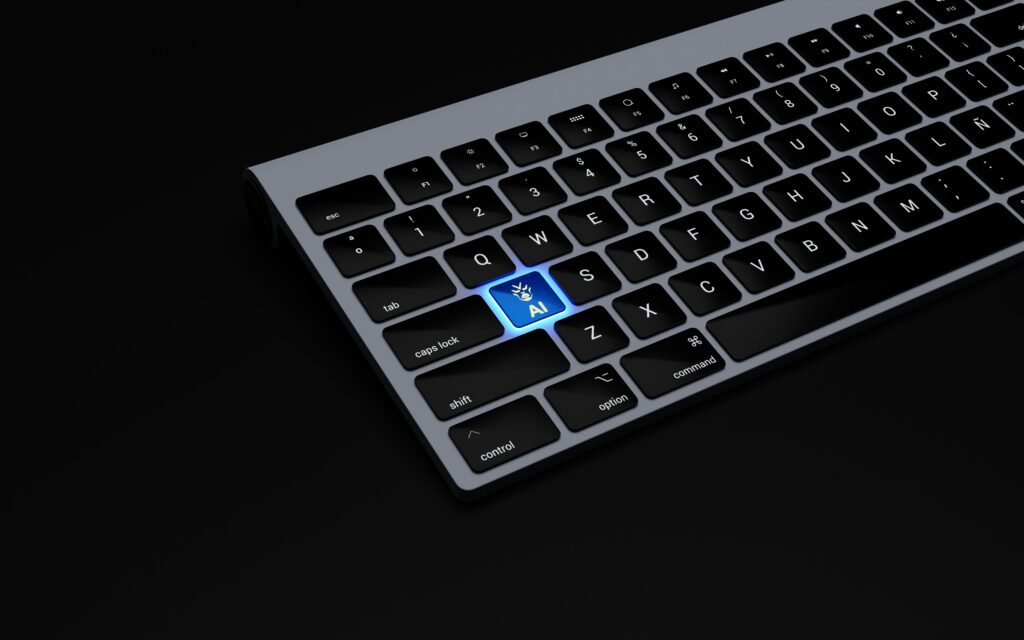 black background with a keyboard. one of the keys is lit in blue with the letters AI on it. 